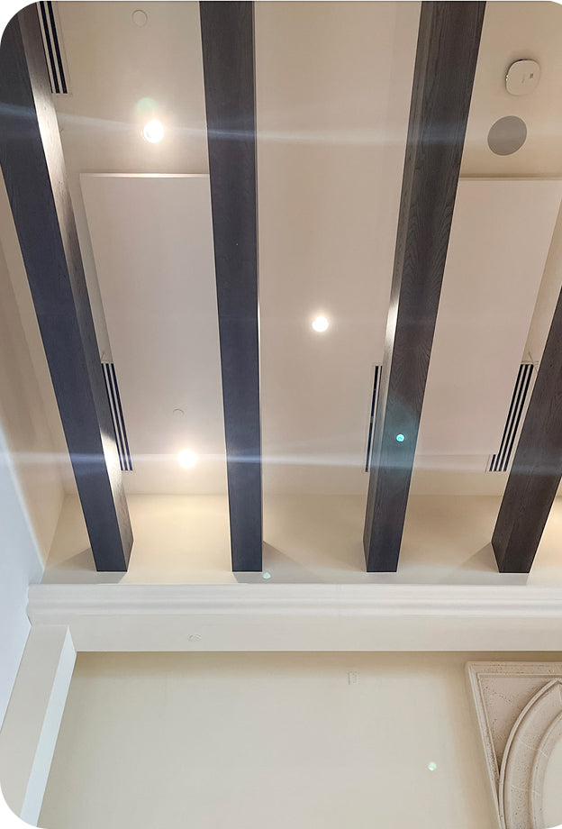 Ceiling detail from Overtone's Boca Raton project showing beams, lights, and ventilation to coordinate around