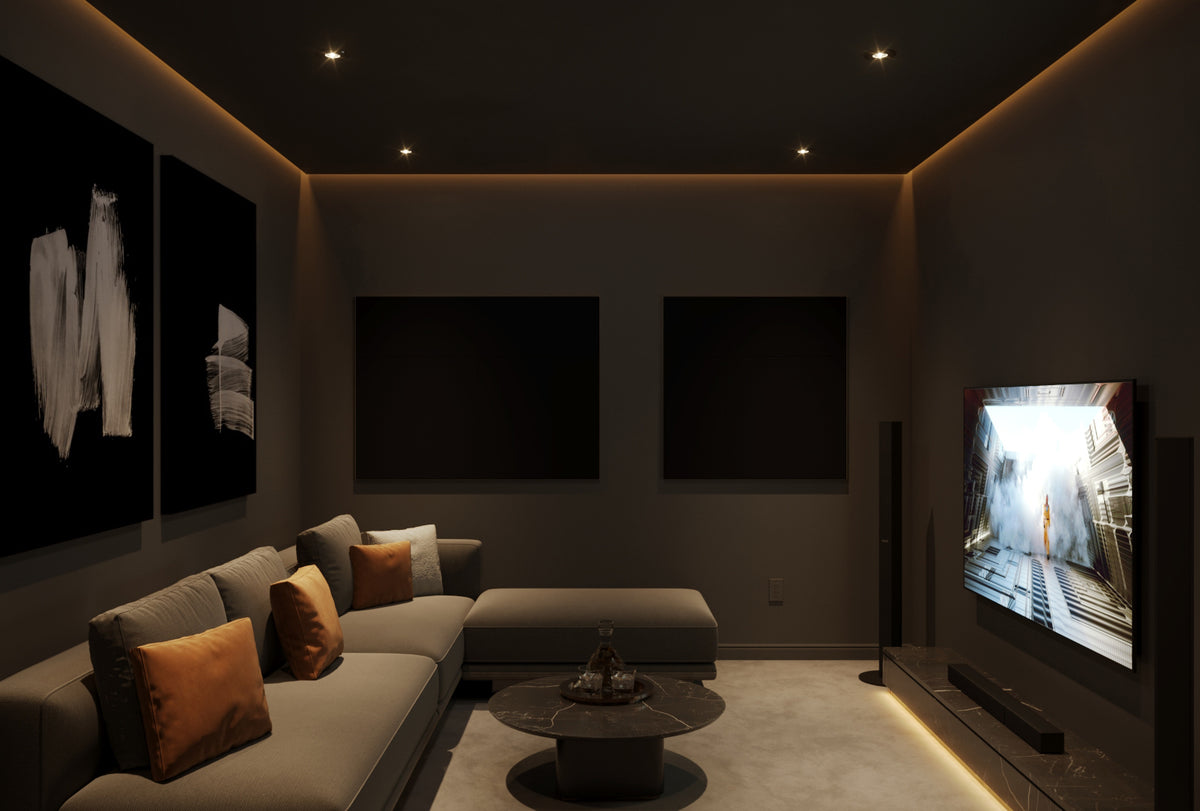 Compact home theater with acoustic panels positioned behind the seating area